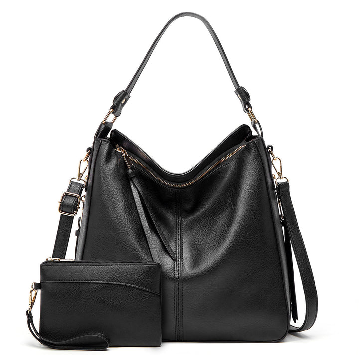 ERIKA ELEGANT LEATHER BAG WITH LARGE CAPACITY AND SIDE POCKETS