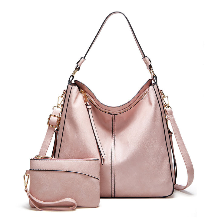 ERIKA ELEGANT LEATHER BAG WITH LARGE CAPACITY AND SIDE POCKETS