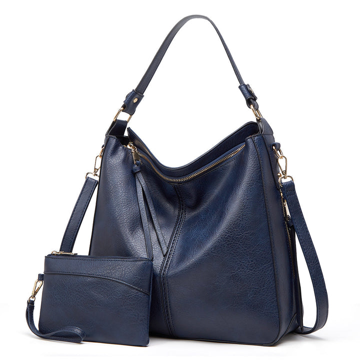 ERIKA ELEGANT LEATHER BAG WITH LARGE CAPACITY AND SIDE POCKETS