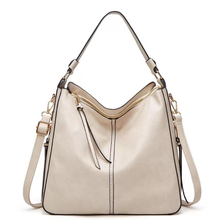 ERIKA ELEGANT LEATHER BAG WITH LARGE CAPACITY AND SIDE POCKETS