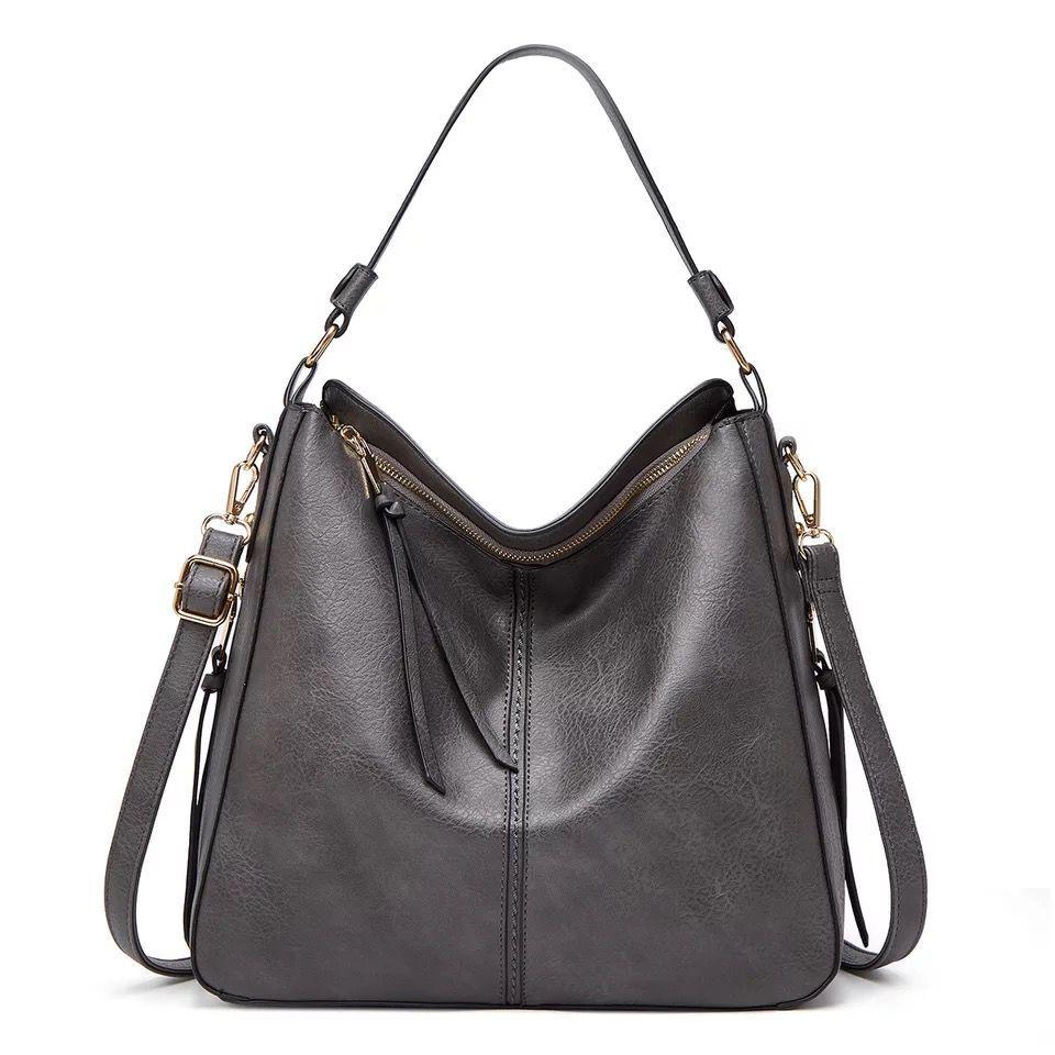 ERIKA ELEGANT LEATHER BAG WITH LARGE CAPACITY AND SIDE POCKETS