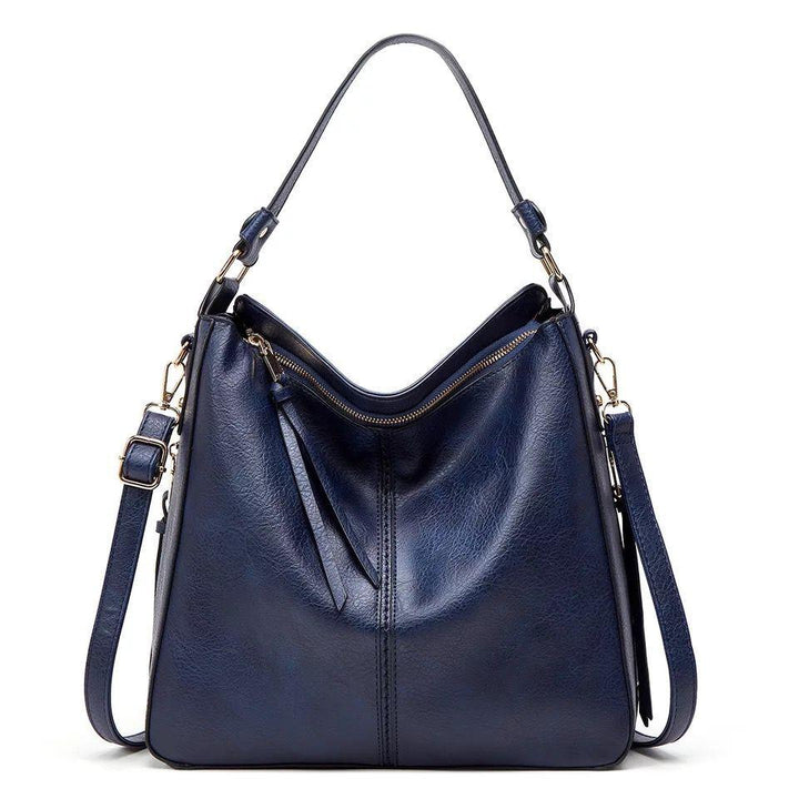 ERIKA ELEGANT LEATHER BAG WITH LARGE CAPACITY AND SIDE POCKETS